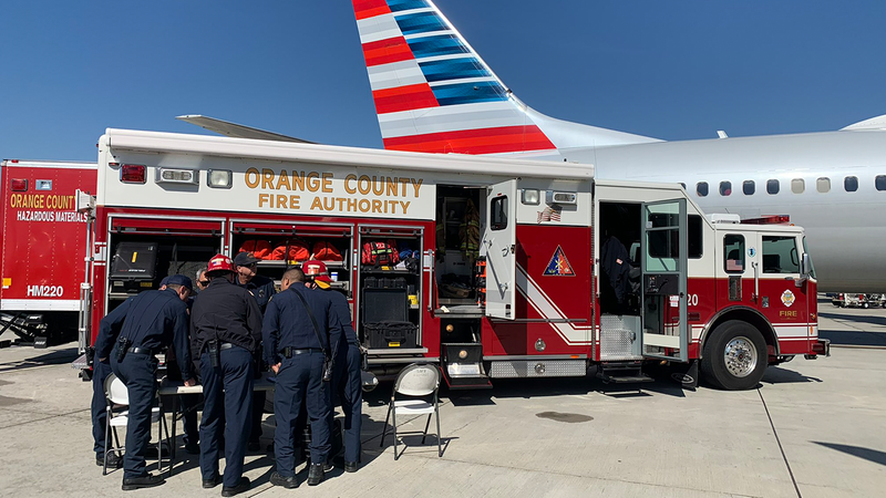 Orange County Fire Authority Hazmat team works to determine and unknown substance discovered at the John Wayne Airport on Feb. 25, 2022.