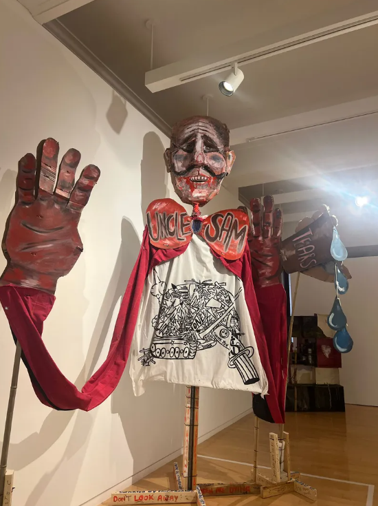 Art display at Chicago Cultural Center entitled “US-Israel War Machine”