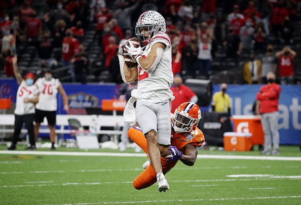Chris Olave hauls in a catch for Ohio State