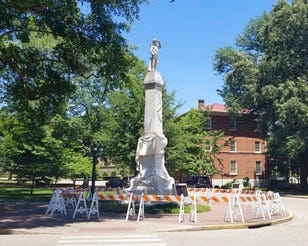 FILE - In this Monday, June 1, 2020 file photo, a tarp covers part of a Confederate monument on the University of Mississippi campus in Oxford, Miss. (Nick Suss/The Clarion-Ledger via AP, File)