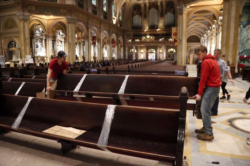 Crews remove pews at OLV