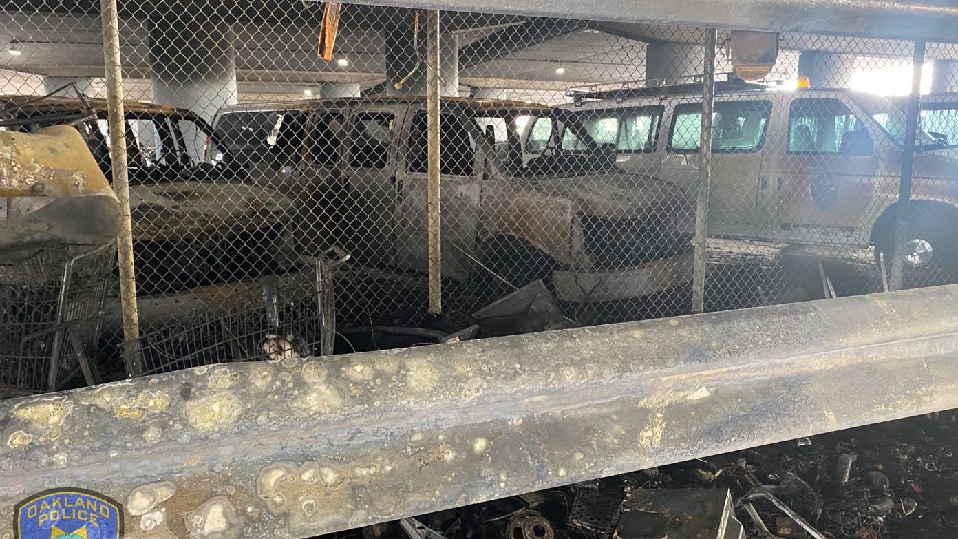 Encampment blaze destroys 3 Oakland Police cars