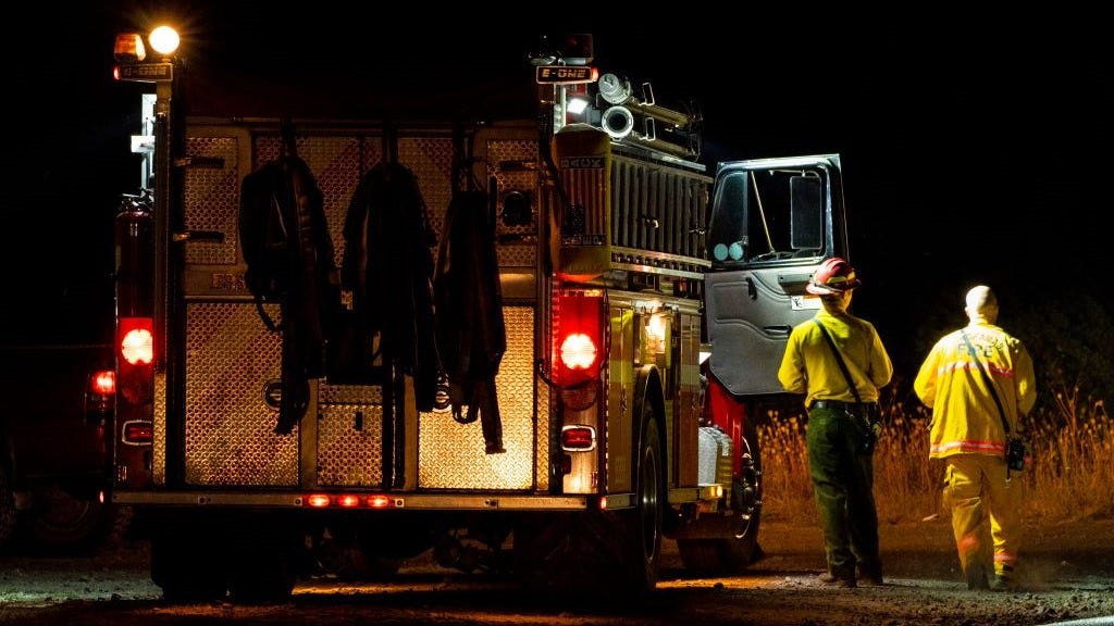 Residents tie man to a tree and wait for police after he sets wildfires