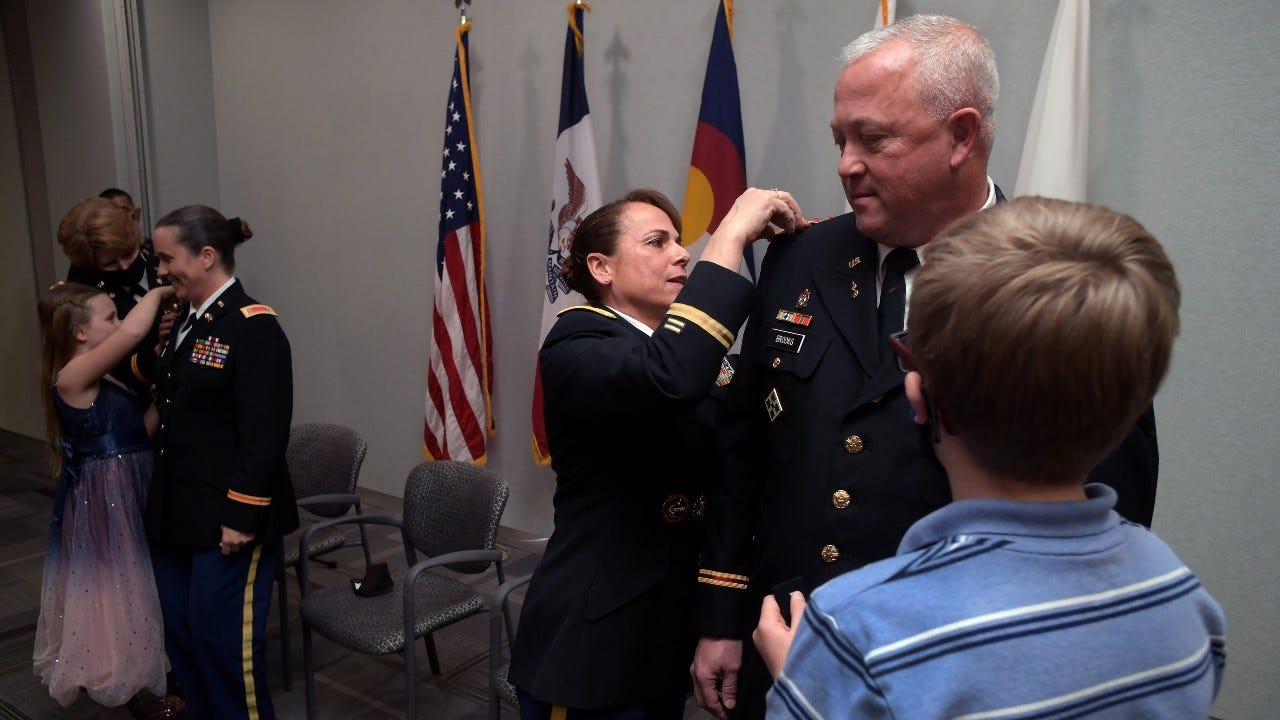 Army Guard husband, wife promoted to chief warrant officer 5