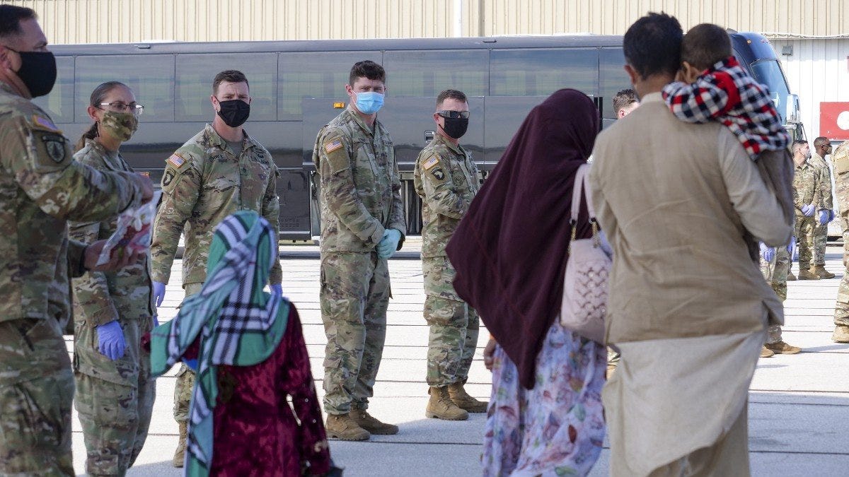 Afghan evacuees arrive in Indiana, head to Camp Atterbury