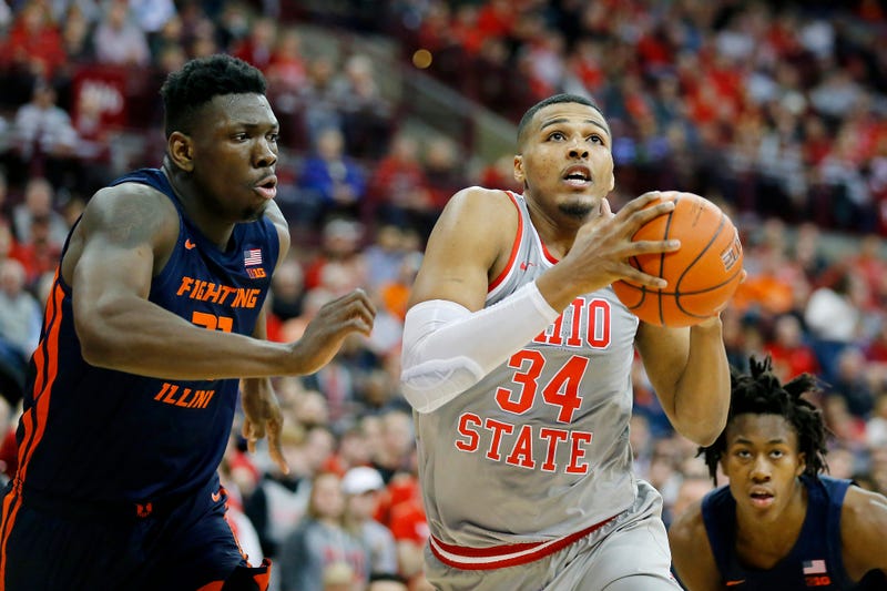 Mar 5, 2020; Columbus, Ohio, USA; Ohio State Buckeyes forward Kaleb Wesson (34) goes in for two past Illinois Fighting Illini center Kofi Cockburn (left)during the second half at Value City Arena.
