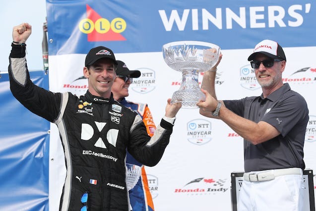 Simon Pagenaud Receives Trophy In Victory Lane At Toronto
