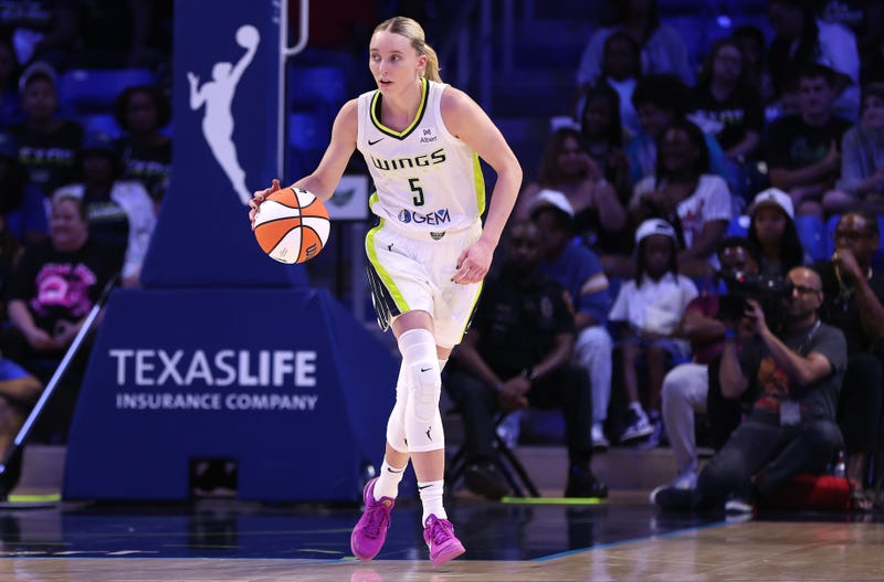 Dallas Wings' Paige Bueckers brings the ball up the court