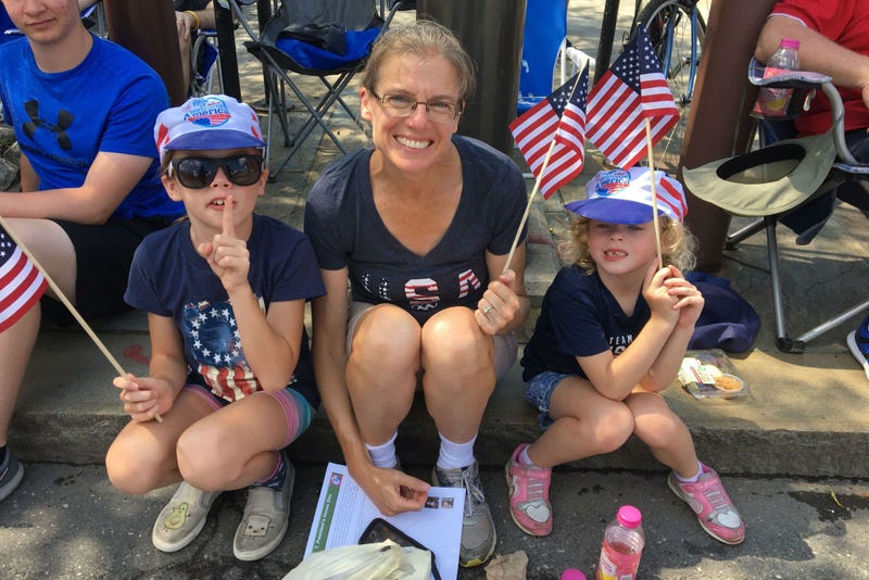 People wait along Independence Mall in Philadelphia for the 2019 Independence Day Parade to start. 