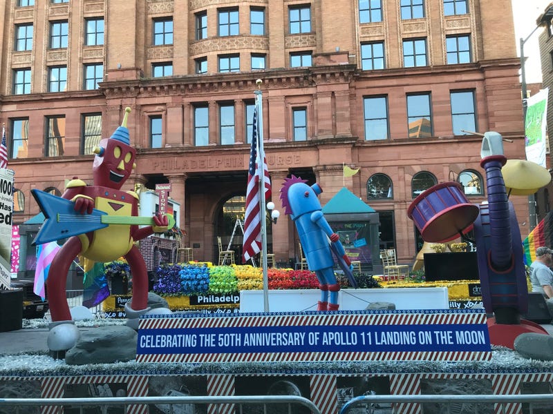 Floats begin to line up for the Independence Day Parade.