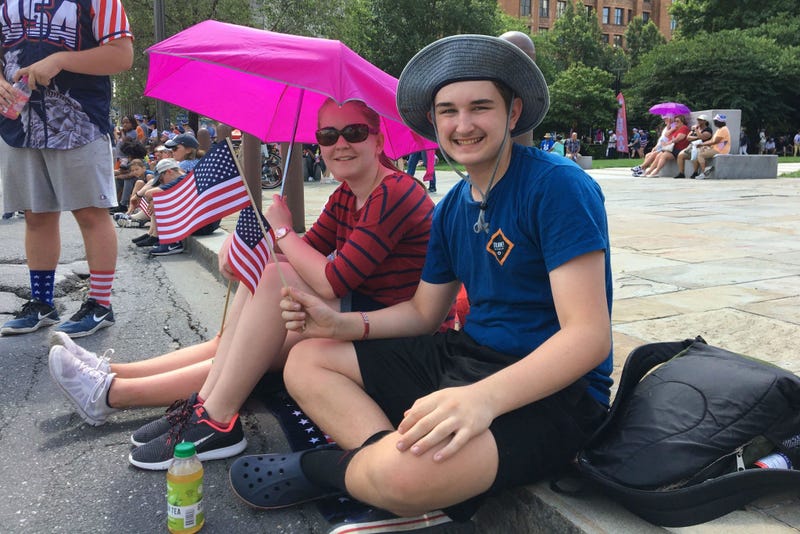 People wait along Independence Mall in Philadelphia for the 2019 Independence Day Parade to start. 