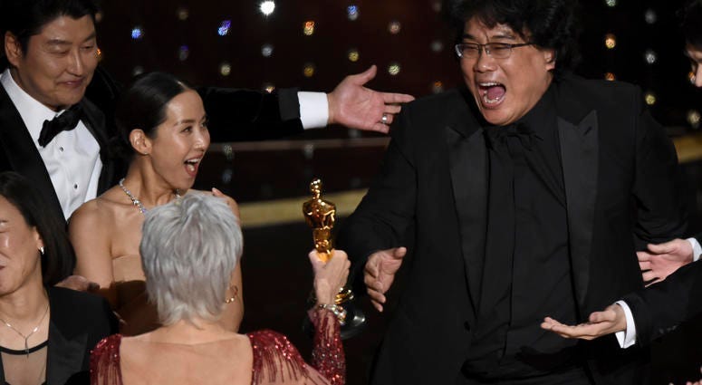 Bong Joon Ho is presented the award for Best Picture at the Oscars