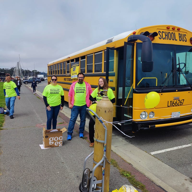Parents led a caravan through San Francisco to gather recall signatures.