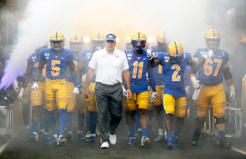 Pittsburgh Panthers head coach Pat Narduzzi (center) leads the team onto the field to play the Ohio Bobcats at Heinz Field. Pittsburgh won 20-10.