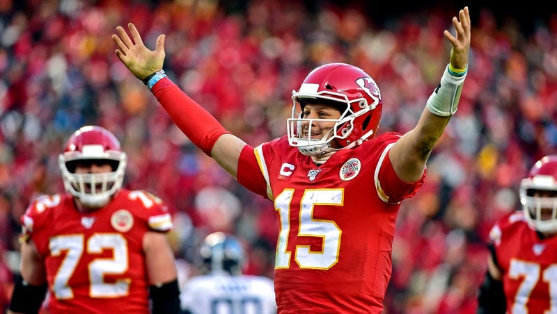 Chiefs quarterback Patrick Mahomes celebrates after throwing a touchdown against the Titans in the AFC Championship Game.