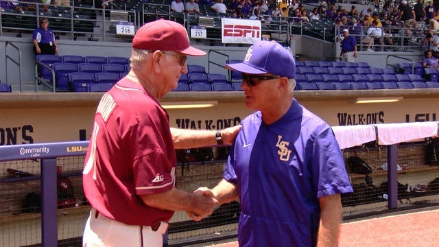 Paul Mainieri and Mike Martin shake hands