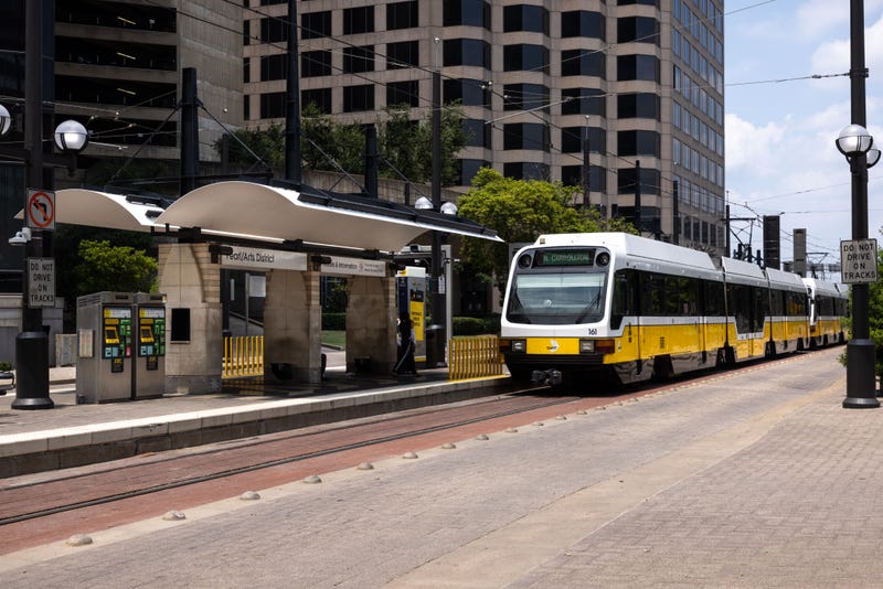 Dallas Area Rapid Transit is correcting its earlier statement about a suspect being in custody after a fatal shooting at a DART station Sunday night.