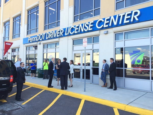 A former PennDOT executive was charged for soliciting and accepting bribes in exchange for contracts, according to the state Attorney General's Office.
