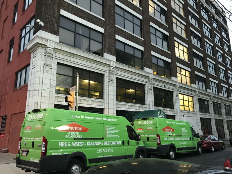 Clean-up crews at People for People Charter School