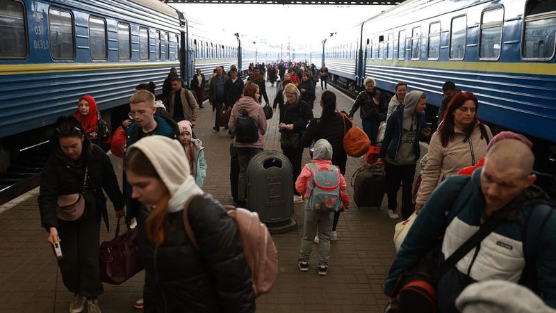 People arrive at the central train station from Pokrovsk, in the eastern part of Ukraine on April 11, 2022 in Lviv, Ukraine.