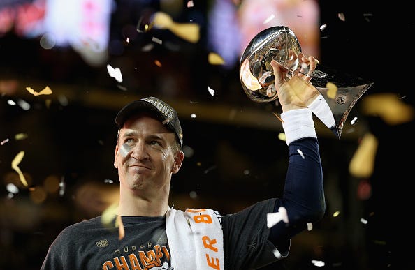 Peyton Manning celebrates winning a Super Bowl
