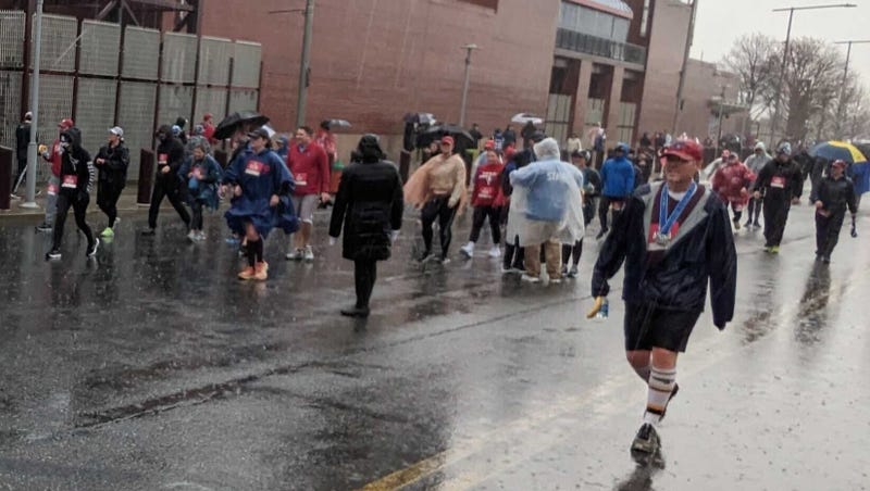 People take part in the Phillies Charities 5K.