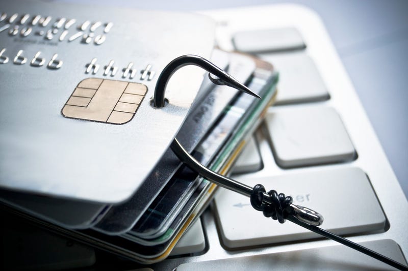 phishing image of hook through credit cards