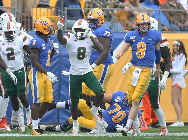 Miami Hurricanes cornerback DJ Ivey (8 left) reacts after his second interception against Pittsburgh Panthers quarterback Kenny Pickett (8 right) during the second quarter at Heinz Field.