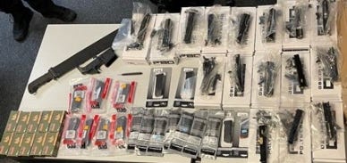 The cache of gun components, ammunition and accessories confiscated from Burroughs in Westchester.