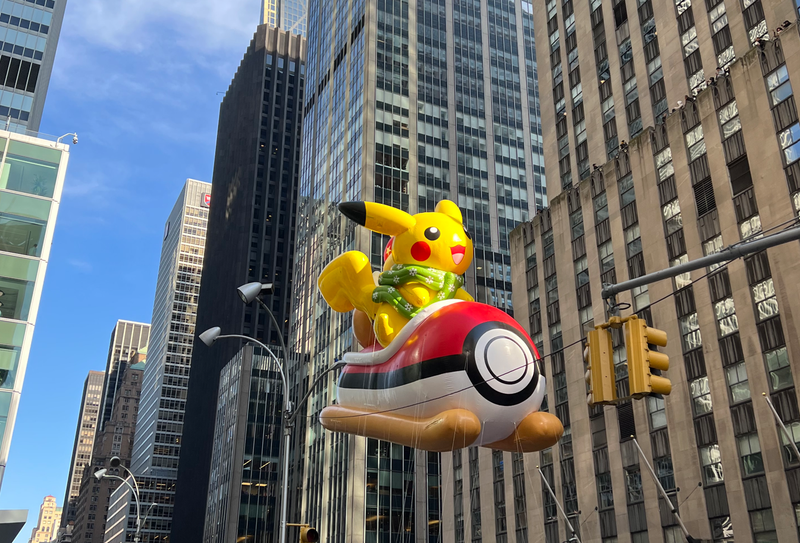 Pikachu riding a Pokémon themed sled