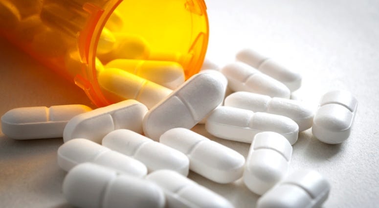 pills spilled out of prescription bottle