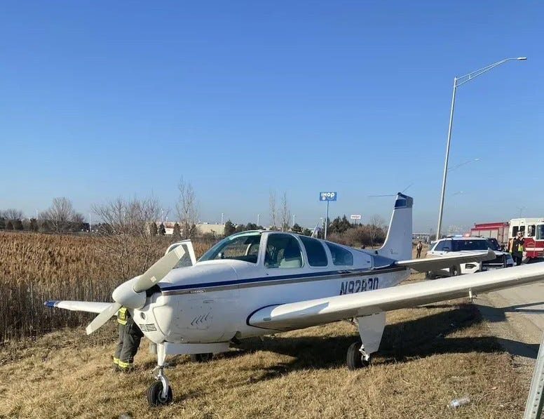 plane near cornfield