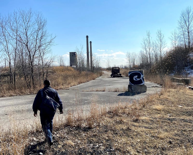 Man walking on former industrial site
