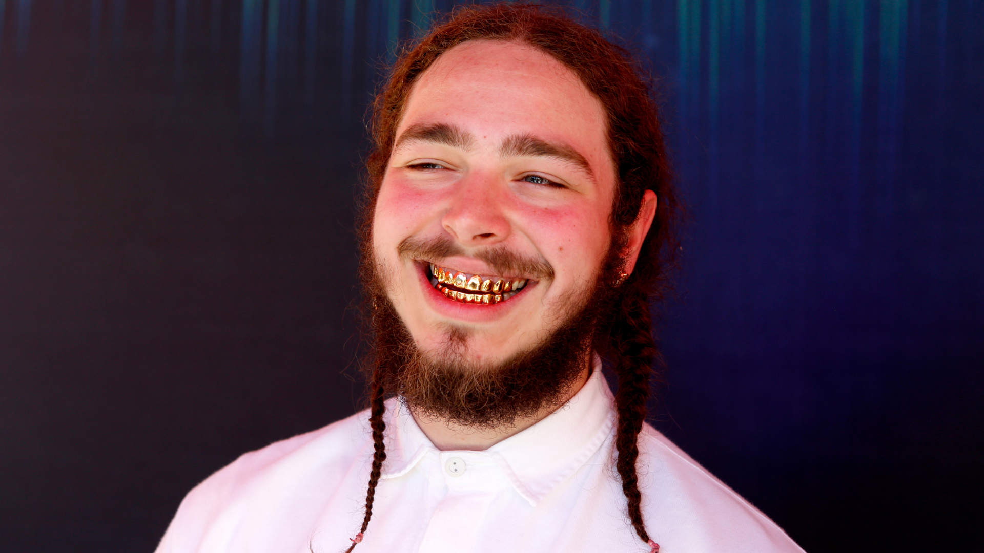 See Post Malone's new $1.6 million diamond fangs