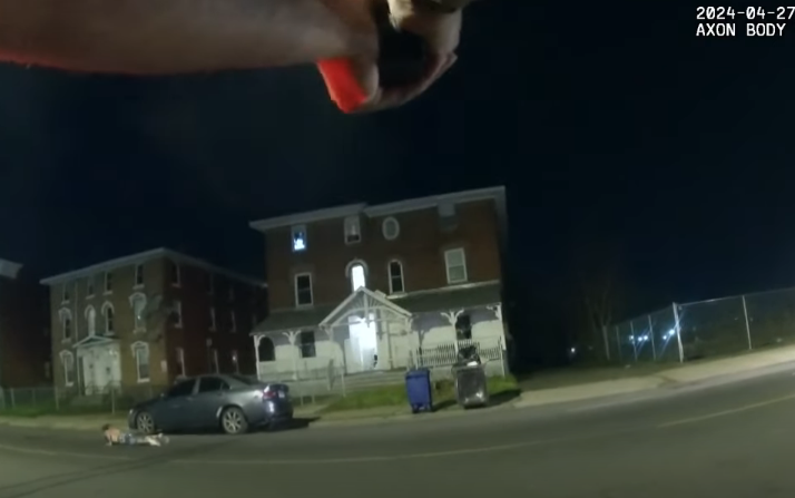 In this image from a bodycam video, a Hartford police officer returns fire in the direction of two men on Wethersfield Ave., 4/27/24