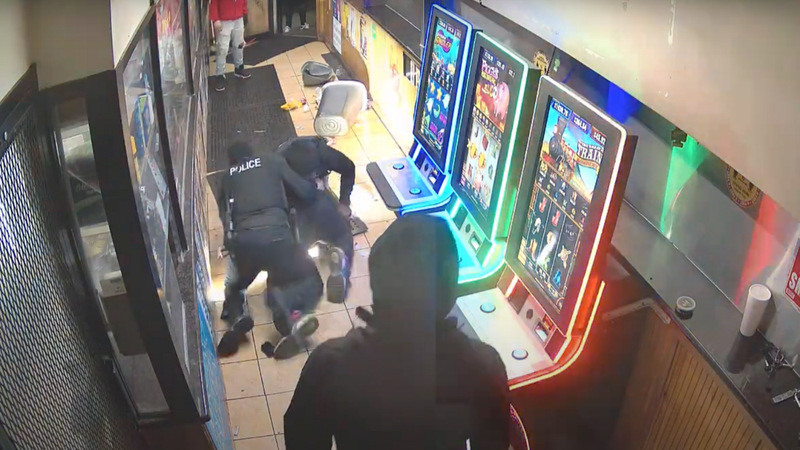 A still from surveillance video, provided by police, shows a struggle between officers and Alexander Spencer on Jan. 26, 2024.