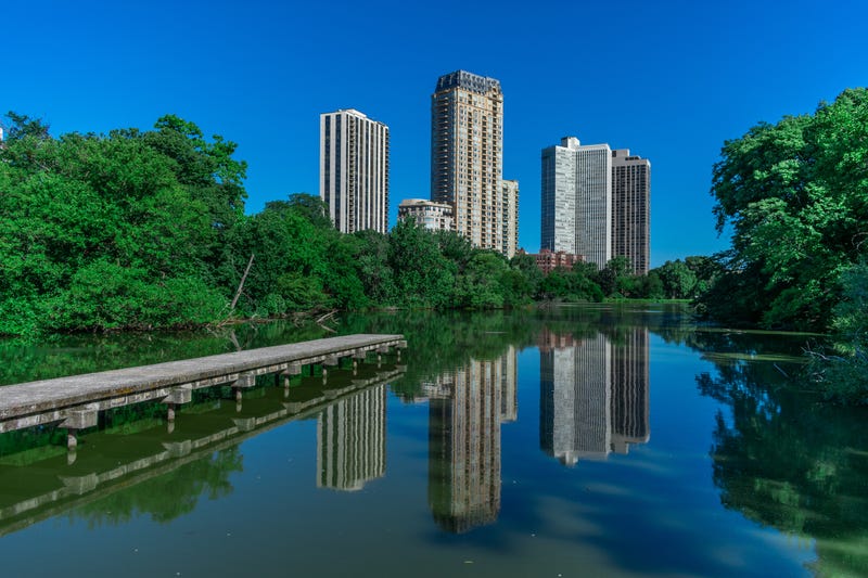 North Pond with buildings reflected in water