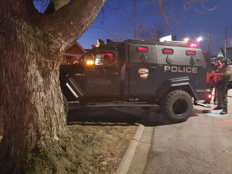Officers from the Posen Police Department conduct search warrant of suspect's home who threatened police on social media