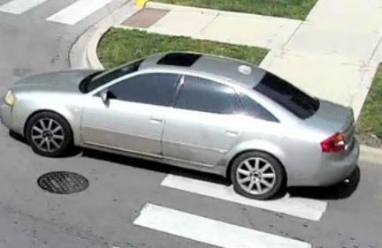 surveillance image of postal robbery suspect