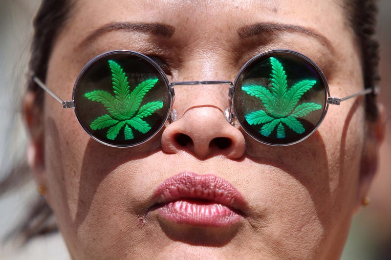 Lisa Marie, of Oakland, California, takes part in a 420 Day rally in front of the Federal Building in downtown Oakland on Friday, April 20, 2012.