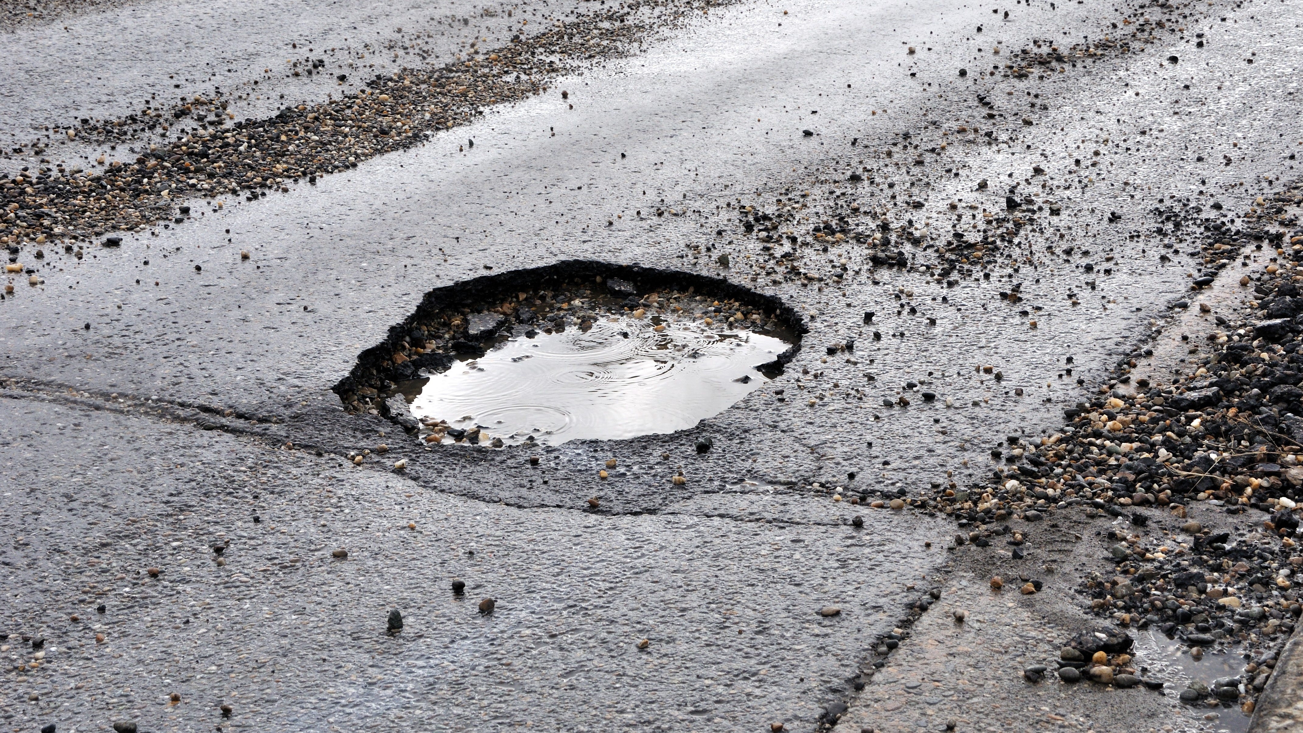 Minnesota pothole season brings headaches, hefty price tag for cities and motorists