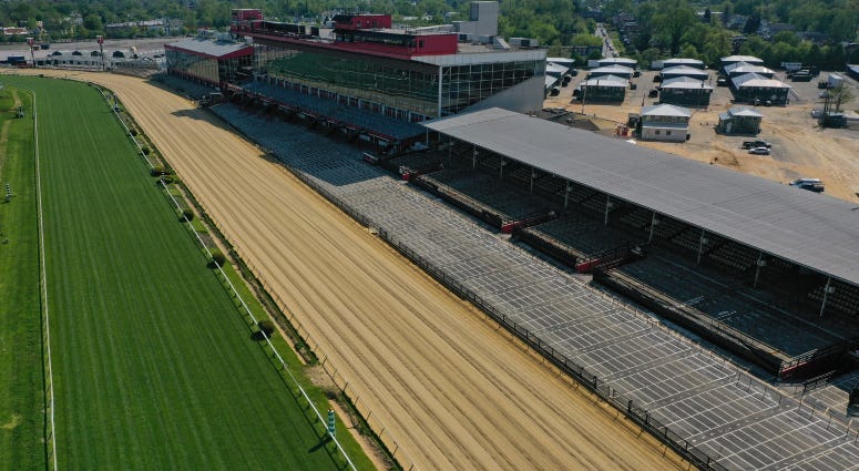 Improbable  participates in a morning workout at Pimlico Race Course on May 16, 2019, in Baltimore. 