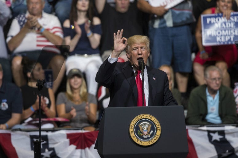 President Donald Trump speaks at the US Cellular Center for a rally.