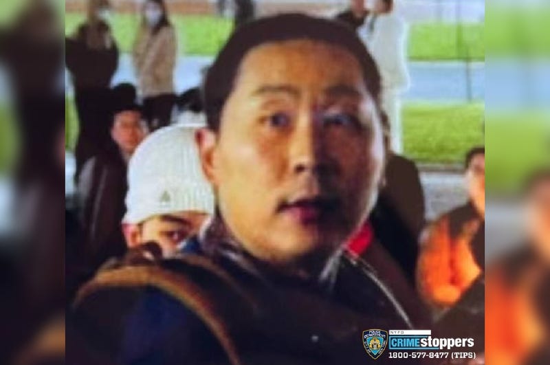Police are searching for a man they say pummeled a woman unconscious at a Columbia University protest over China's COVID-19 rules