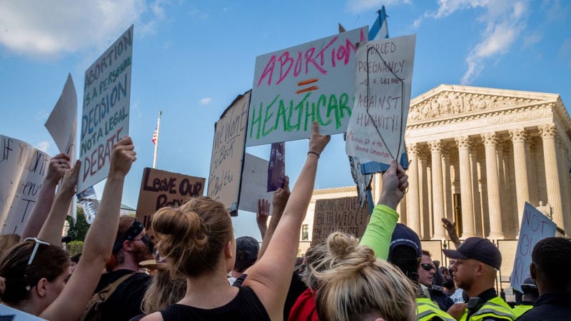 Abortion-rights demonstrators protest in front of the Supreme Court building following the announcement to the Dobbs v Jackson Women's Health Organization ruling on June 25, 2022 in Washington, DC.