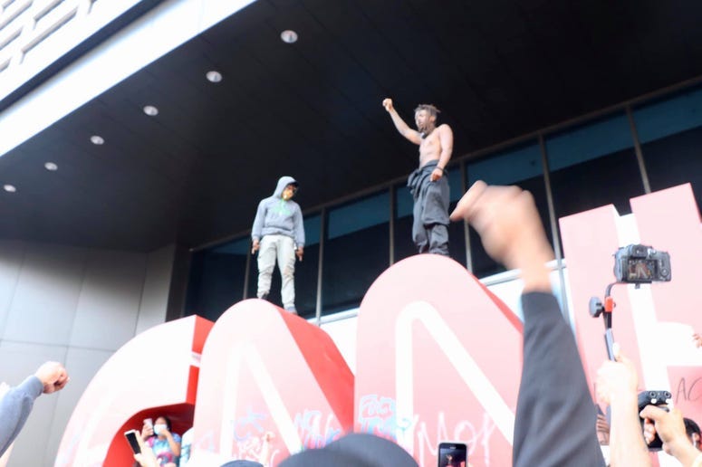 Protesters Damage CNN Bldg_1_Amanda Cooper.jpg
