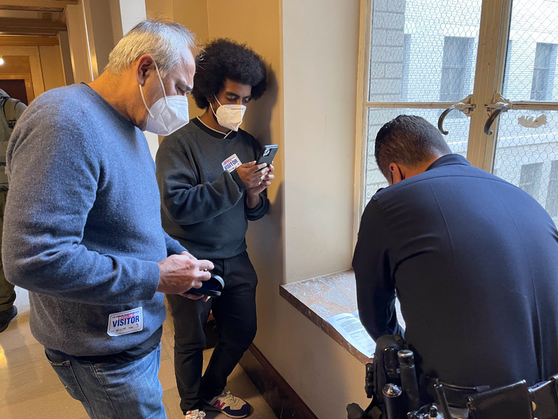 Ahead of Tuesday morning’s L.A. council meeting a protestor (pictured left) banned from this meeting, because of previous disruptions, insisted on going inside.