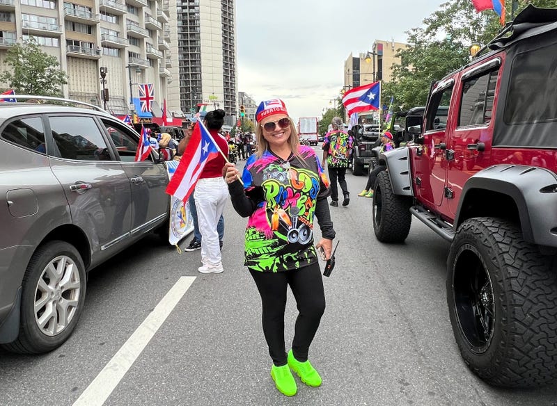 Maribell Oquene celebrates along the Ben Franklin Parkway, at the city's Puerto Rican Day Parade.
