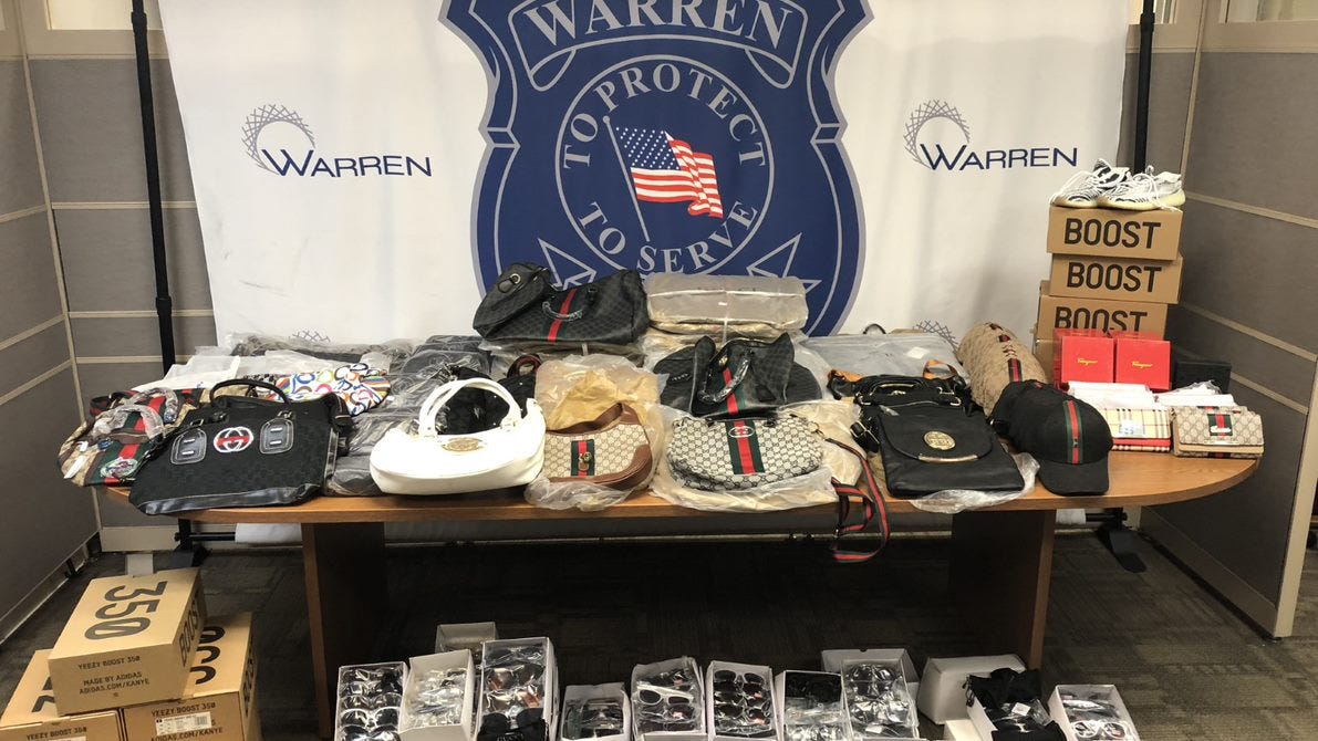 7 busted for selling phony designer handbags, sunglasses at Warren flea market