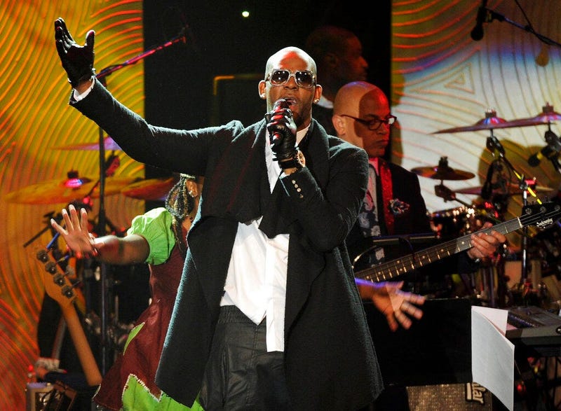 In this Jan. 25, 2014 file photo, recording artist R. Kelly performs at The 56th Annual Grammy Awards Salute to Industry Icons with Clive Davis in Beverly Hills, Calif.